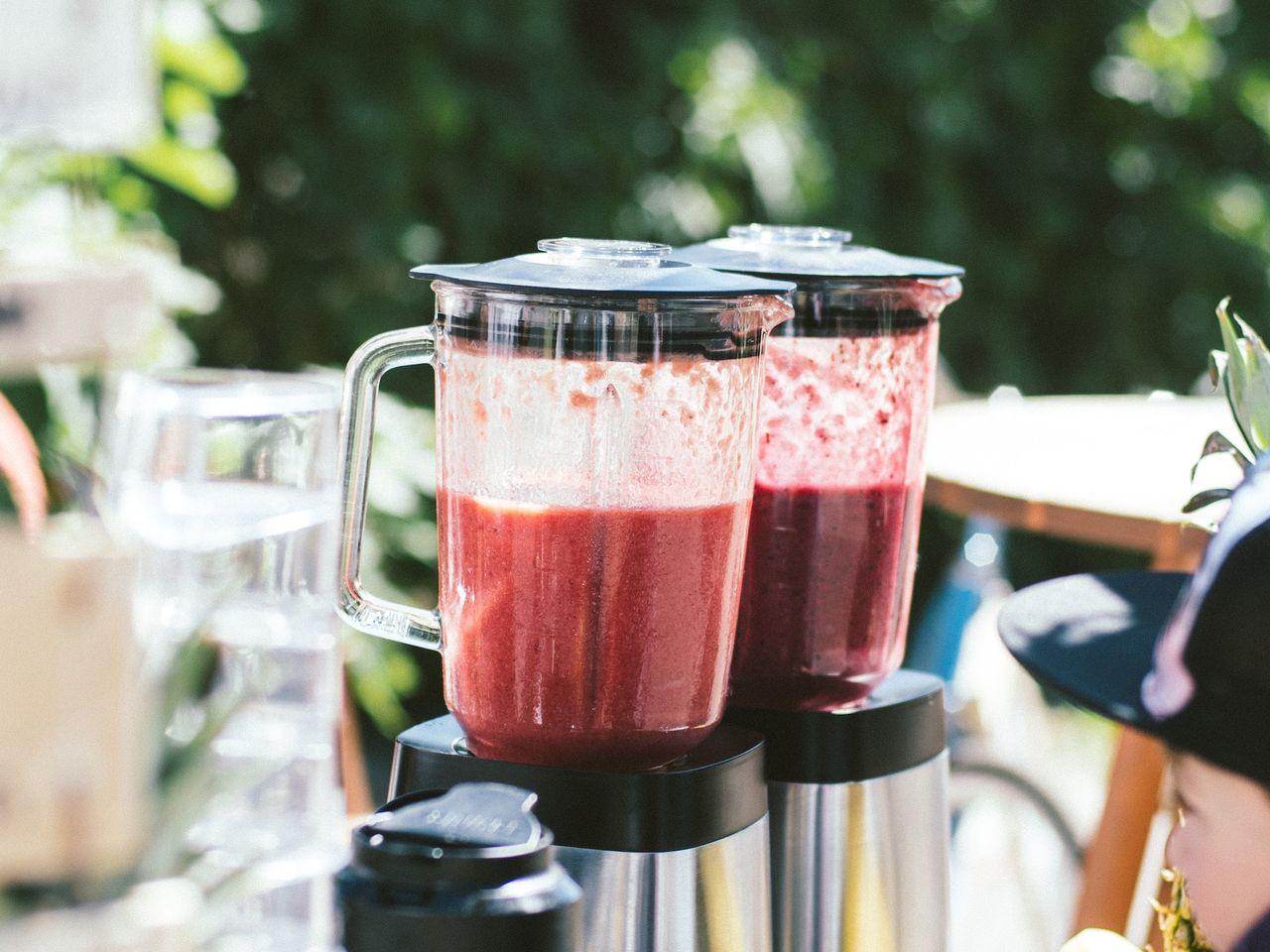 two silver electric blenders